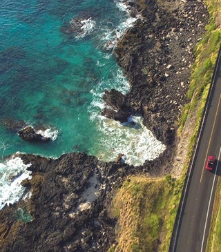 Sporty's 50 fun flying destinations header with ocean shown near shore