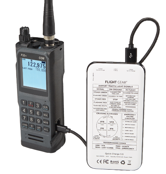 PJ2+ COM Radio displayed with it being plugged into backup battery